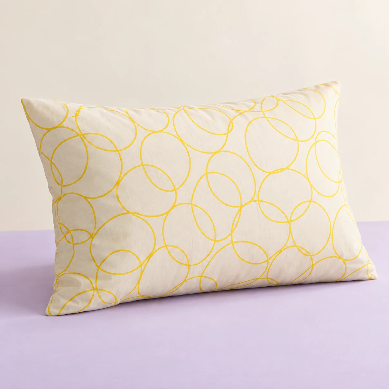 Lemon Loop Pillowcase — Cream with lemon-yellow circular loops